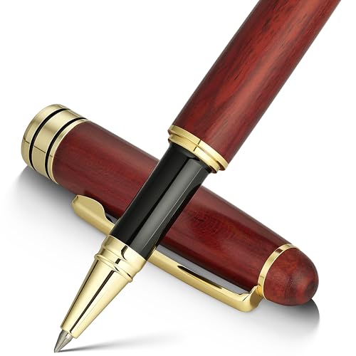 Rosewood and gold pen with a fine tip