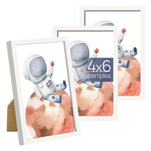Three thin-border white picture frames