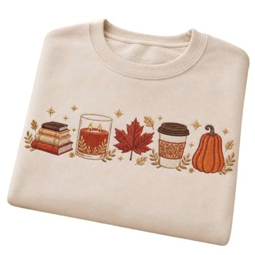 Cream crewneck embroidered with a book stack, maple leaf, coffee cup and small pumpkin in a row