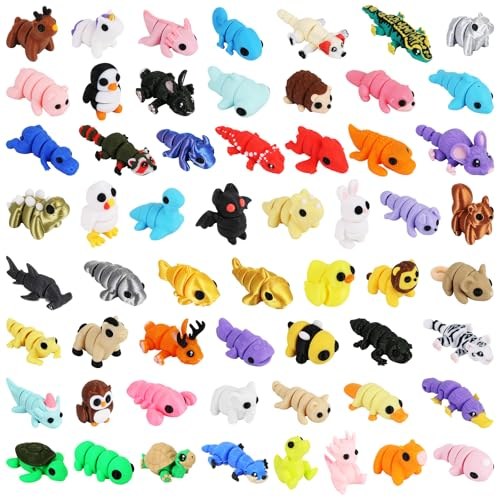 Colorful jointed 3D printed animal figures including dragons, dinosaurs and octopuses