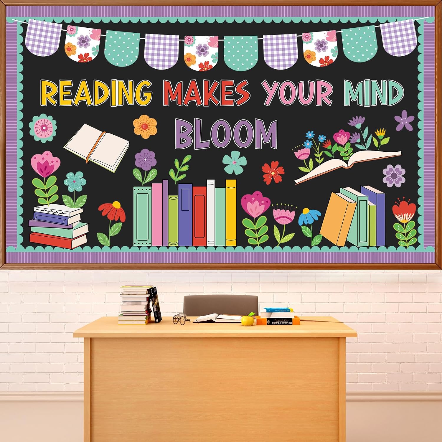 Retro floral and stacked book cutouts on a black bulletin board