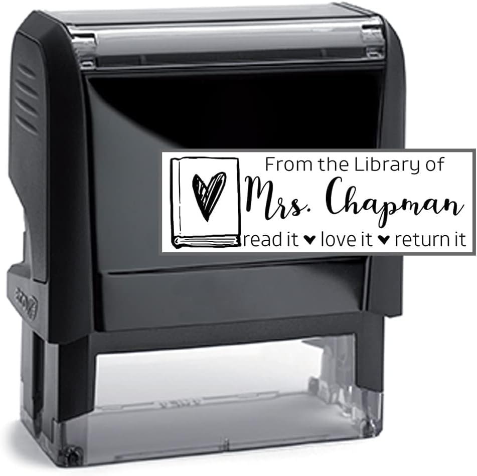 Black self-inking stamp with a from-the-library-of imprint