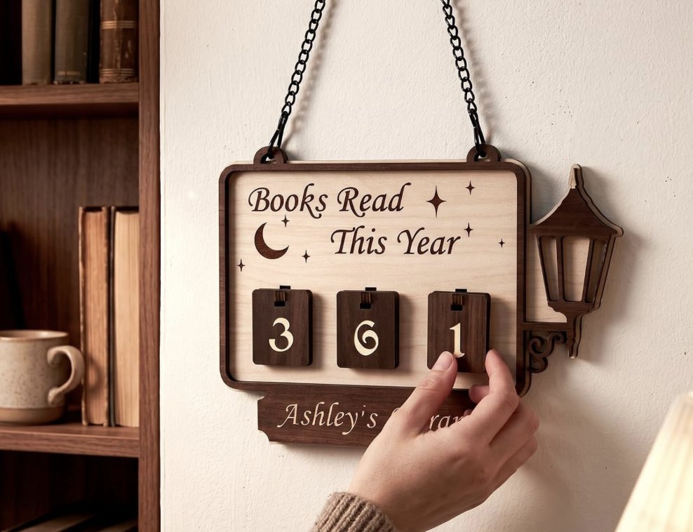 Wooden hanging sign with flip number tiles counting books read this year