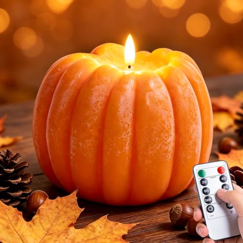 Large orange wax pumpkin candle with a flickering LED flame and a handheld remote