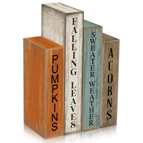 Freestanding wooden blocks painted as book spines reading Pumpkins, Falling Leaves, Sweater Weather and Acorns