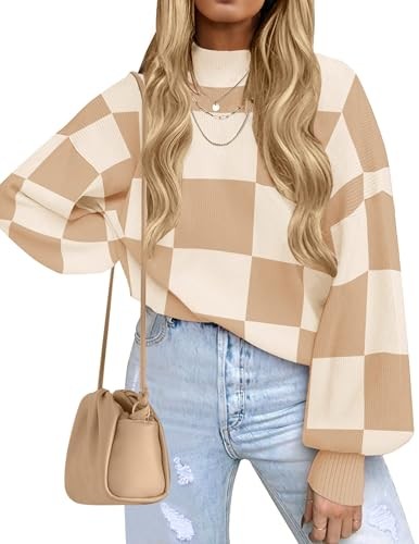 Oversized pullover in a large tan and cream checkerboard pattern