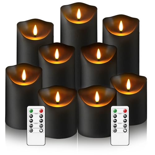 Nine black pillar candles in graduated heights with warm flickering LED flames