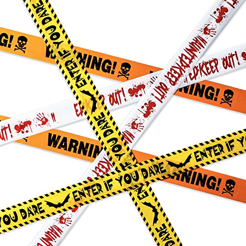 Rolls of orange and black caution tape printed with Halloween warning phrases