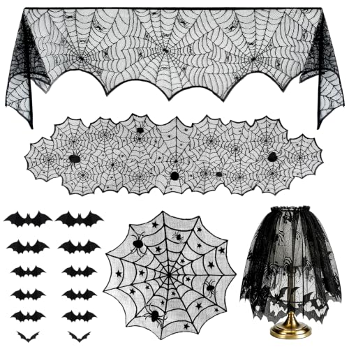 Black lace spiderweb tablecloth, mantel scarf and bat stickers arranged on a table