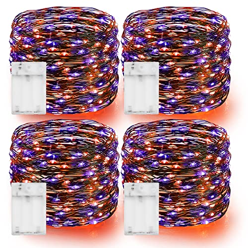 Four coils of thin copper wire fairy lights glowing purple and orange