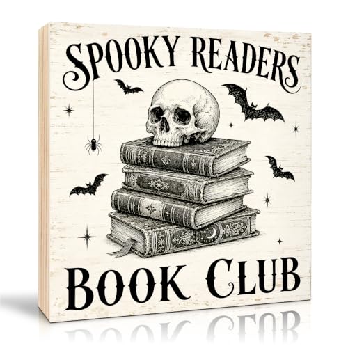 Wooden box sign with a skeleton reading and the words spooky readers book club