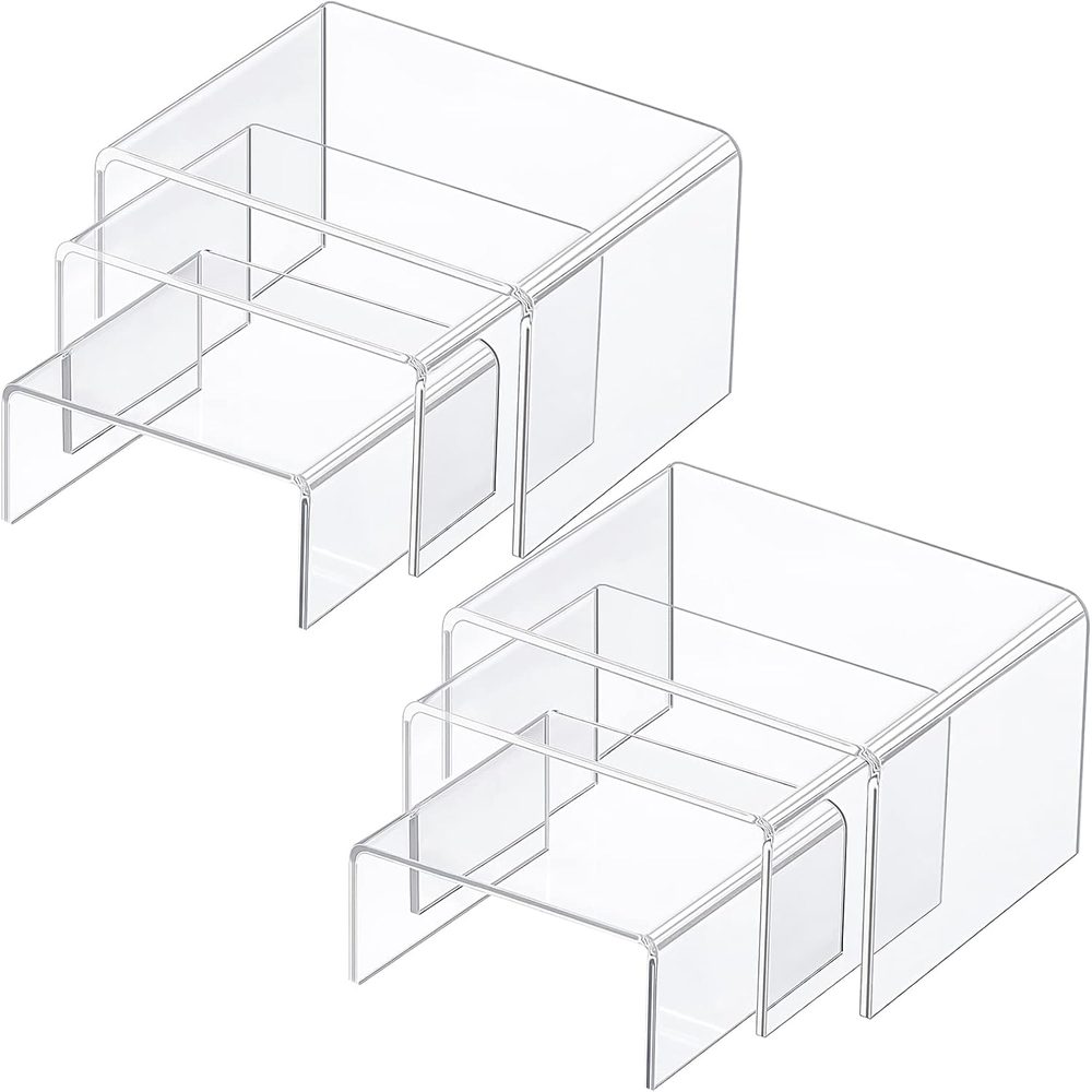 Set of small clear acrylic display risers in graduated sizes