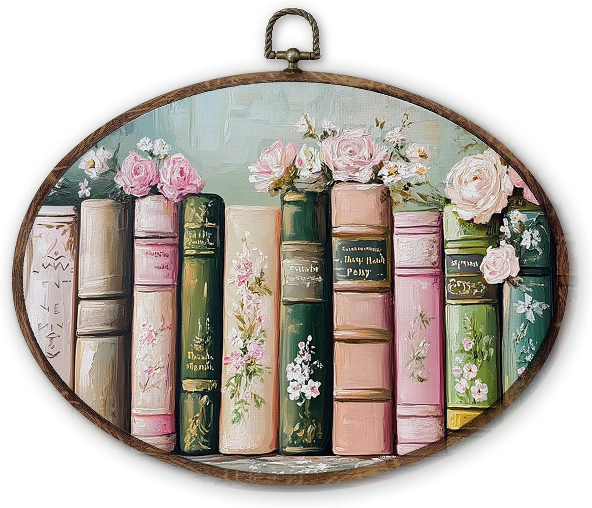 Oval wood framed canvas of pale book spines with pink roses painted in thick strokes