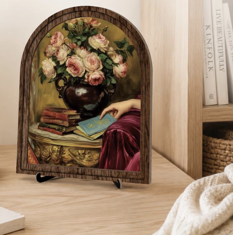 Arched wood panel printed with a Baroque still life of roses and books on an easel stand